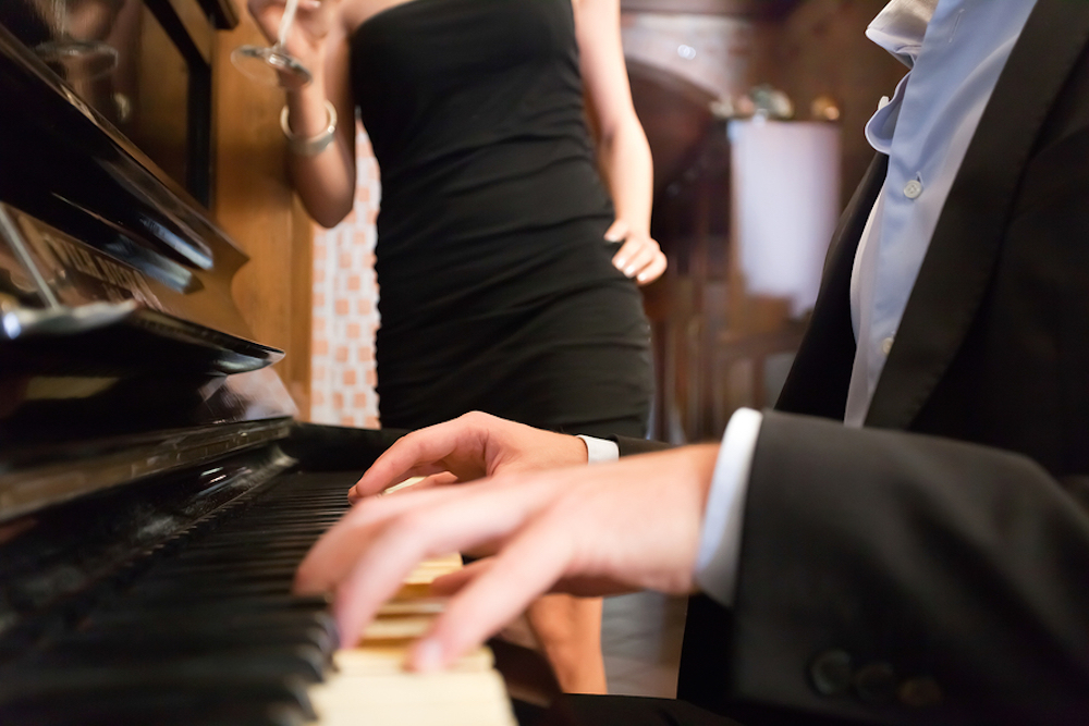 bigstock-Man-playing-piano-for-his-girl-41608657