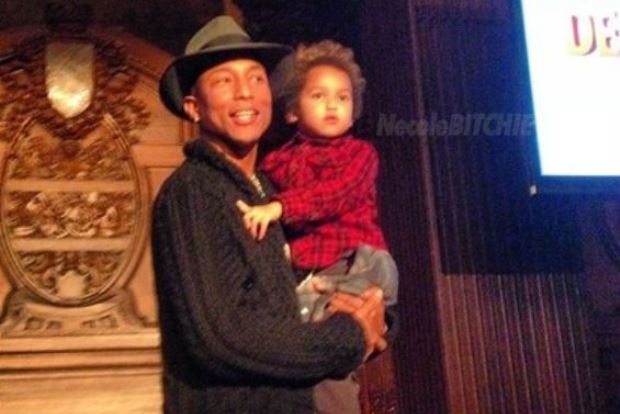 Pharrell-and-his-son-Rocketman-at-Art-Basel